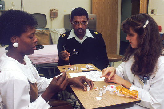 Nurse providing patient education and support